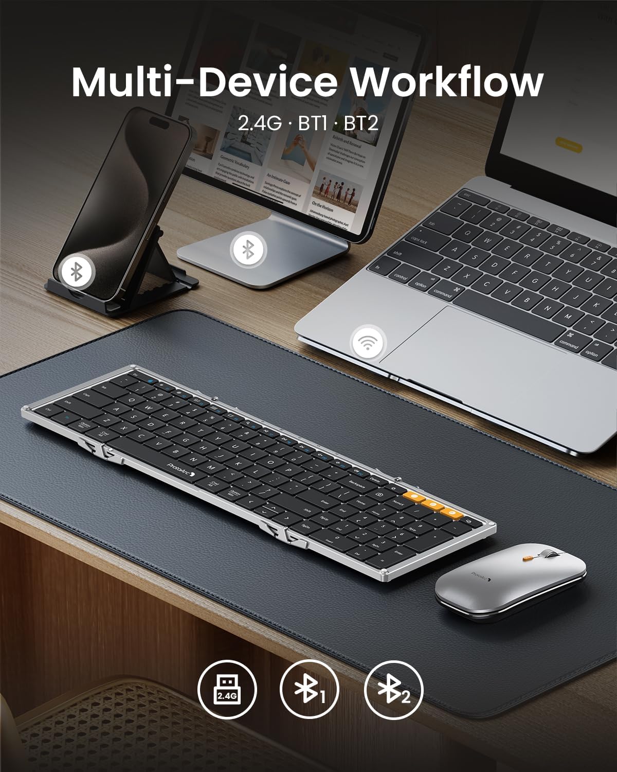 ProtoArc XKM01 desfăcută pe birou, lângă laptop și tabletă